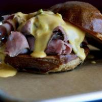 Beef & Cheddar Sandwich · Our famous roast beef, sliced thin and piled high on a pretzel roll. Topped with our housema...