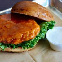 Buffalo Chicken Sandwich · Breaded and fried, crispy chicken breast, tossed in our house made buffalo sauce and served ...