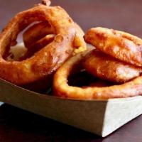 Onion Rings · Thick cut, beer battered onion rings.