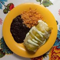 Pork Chile Verde Burrito · Slow cooked pork, black bean corn relish & rice topped with tomatillo sauce and crema fresca.