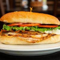 Smoked Turkey Blt · Juicy smoked turkey topped with melted swiss cheese. Crispy bacon, lettuce and tomato on a t...