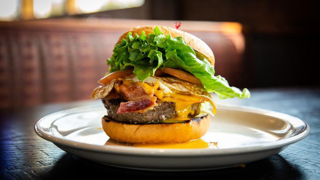 The Texas Burger · A big burger patty topped with bacon, Cheddar cheese and a fried egg on a brioche bun.

Consuming raw or undercooked meats, poultry, seafood, shellfish, or eggs may increase your risk of foodborne illness, especially if you have certain medical conditions.