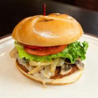 Veggie Burger · A black bean veggie burger with mushrooms, grilled onions and Swiss cheese.