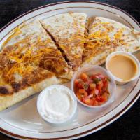 Bbq Quesadilla · A crisp flour tortilla stuffed with BBQ pulled pork, pulled chicken or grilled chicken, melt...