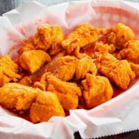 Boneless Chicken Wings · White meat chicken served battered or grilled, tossed in your choice of buffalo, bbq, hog fi...