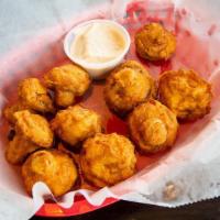 Hand Battered Mushrooms · Fresh button mushrooms battered and crisp-fried to a golden brown. Served with horseradish d...