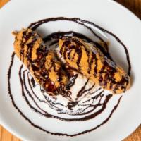 Fried Snickers® · With​ vanilla ice cream – big enough to share.