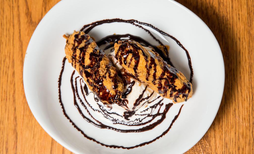 Fried Snickers® · With​ vanilla ice cream – big enough to share.