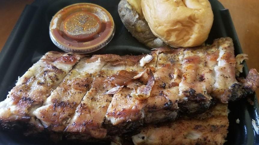 Full Rack · 10-12 baby back pork ribs. Comes with twice Baked Potato, Slaw, and a Dinner Roll.