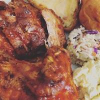 Quarter Chicken · Grilled chicken breast and wing or leg and thigh. Comes with twice Baked Potato, Slaw, and a...