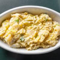 Potato Salad · New! Mayo based with a hint of mustard with egg and green onions.