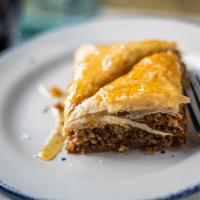 Baklava · Our YiaYia's recipe of ground walnuts and pistachios with crispy phyllo dough and sweet hone...