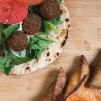 Falafel Sandwich · Chickpeas combined with spring onions, parsley, and middle-eastern spices, deep-fried and se...