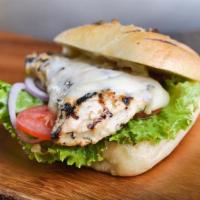 Grilled Chicken Breast Sandwich · Chicken breast grilled to order and Swiss cheese, tomatoes, lettuce and onions on focaccia b...