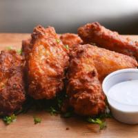 Hot & Spicy Chicken Wings · With BBQ sauce & ranch.