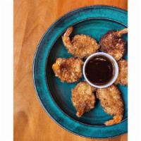 Coconut Shrimp · 7 pieces shrimp dipped in coconut batter and deep fried to golden brown, served with cocktai...