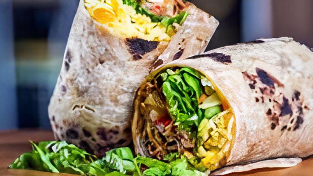 Chapati Wrap · Choice of beef steak, lamb gyro, chicken sautéed or falafel with fresh vegetables and Somali rice, lettuce and ranch (burritos style) with a side of fries or salad. Lamb gyro wrap comes with tzatziki sauce.