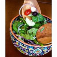 Greek Salad · Romaine lettuce tomatoes, cucumbers, red onions, kalamata olives, feta cheese and bell peppe...