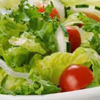 Afro Green House Salad · Romaine and iceberg lettuce with carrots, bell peppers, onion, tomato and our homemade lemon...