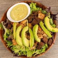 Avocado Chicken Caesar Salad · Sliced grilled chicken breast over emerald lettuce, sliced avocado, boiled egg, croutons, an...