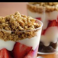 Mixed Berry Parfait · Fresh strawberries, blueberries and yogurt topped with granola.