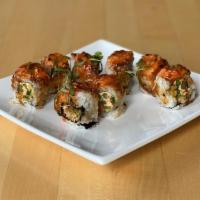 Taiga Roll · Tempura-fried crabcake, chipotle cream cheese, jalapeno, asparagus, and avocado. Rolled in s...