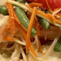 Papaya Salad (Somtom) · Shredded green papaya, green bean, tomatoes and shredded carrot served with fresh chopped ga...