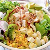 Cobb Salad · Spring mix, tomatoes, cucumbers, avocado, egg, bacon, crumbled blue cheese and grilled chick...