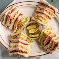 Super Club Sandwich · Triple decker on White or wheat toast with ham, bacon, turkey, lettuce, tomato and American ...