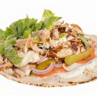 Chicken Shawarma Wrap · Grilled marinated chicken breast, lettuce, tomato, onion, pickles, mayo, garlic spread all w...