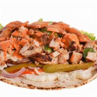 Spicy Crunchy Shawarma Wrap · Grilled marinated chicken breast, Pita chips, lettuce, tomato, onion, pickles,  Spicy mayo, ...