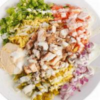 Chicken Shawarma Bowl · Grilled marinated chicken breast, Hummus, Lettuce, tomato, onions pickle, and our special di...