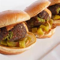 Falafel Sliders · 3 Falafel patties, pickles, and spicy mayo on toasted brioche slider buns.