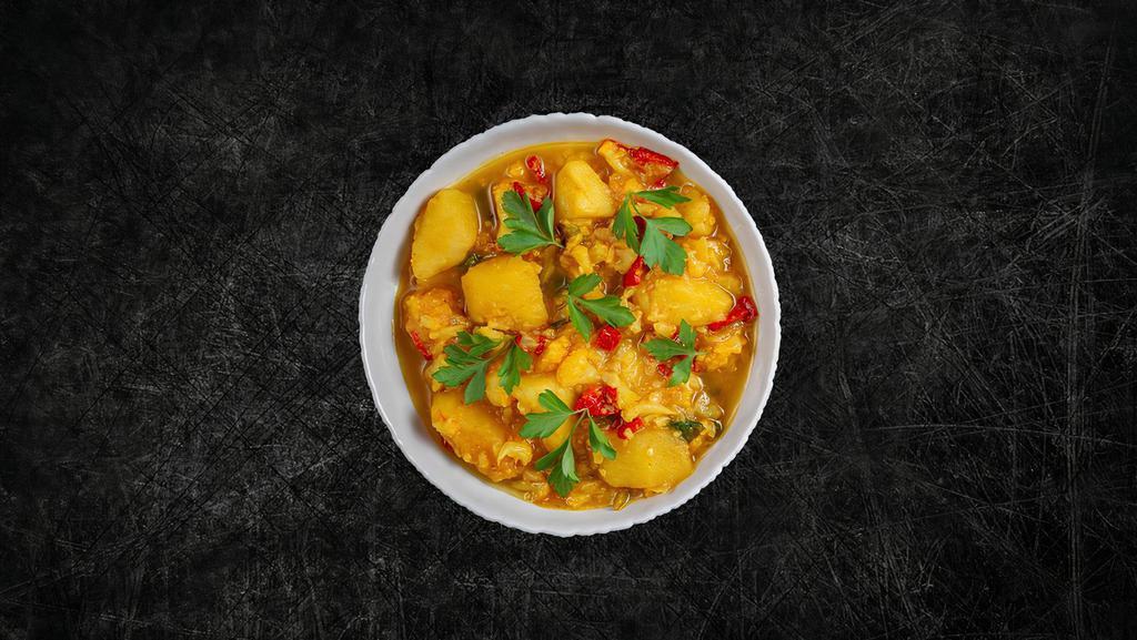 Soulful Cauliflower  & Potatoes (Vegan) · Fresh cauliflower and potatoes slow-cooked in a curry sauce with herbs and spices.