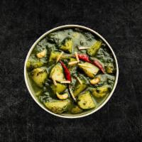 Soulful Spinach & Potato (Vegan) · Diced potatoes slow-cooked till soft in thick ginger and garlic spinach gravy.