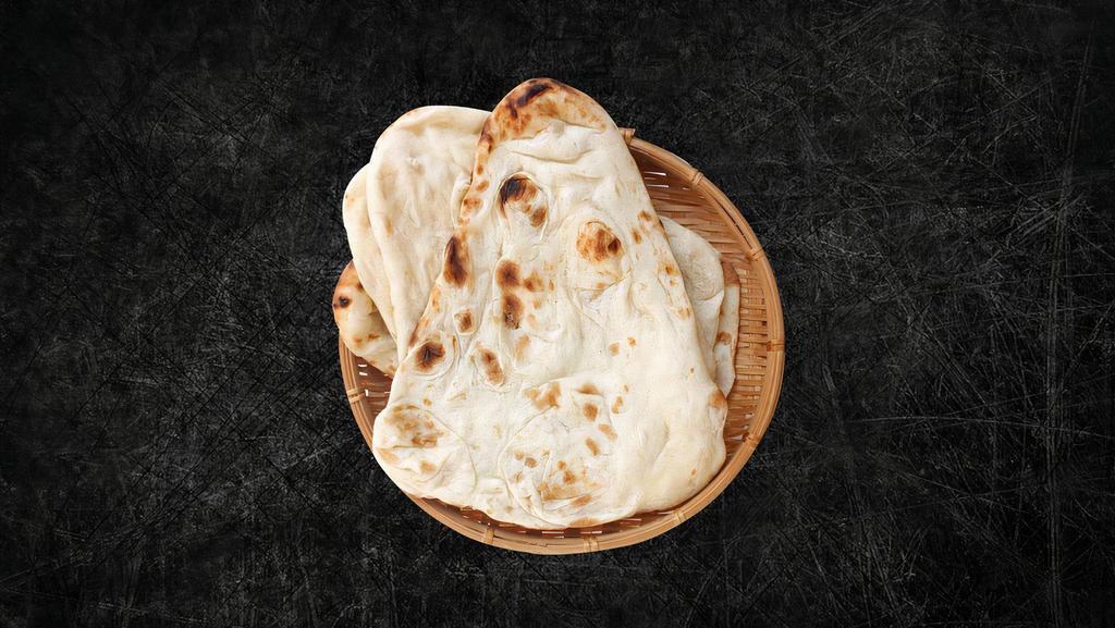 Vegan Naan (Vegan) · Traditional white flour vegan bread.