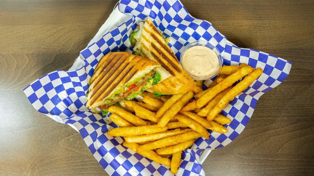 Somali Steak Sandwich · Thin-sliced beef sautÃ©ed with African spices. Served with Swiss cheese, tomatoes, lettuce, onions and mayonnaise on focaccia bread.