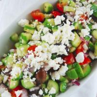 Greek Salad · Romaine lettuce tomatoes, cucumbers, red onions, kalamata olives, feta cheese, and bell pepp...