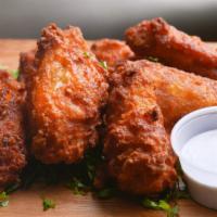 Hot & Spicy Chicken Wings  · With bbq sauce & ranch
