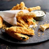 Lemon Pepper Zucchini Small · Hand breaded, lightly fried Zucchini Spears with Lemon Parmesan served with Ranch dressing. ...