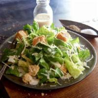 Caesar Salad · Crisp romaine tossed with aged Parmesan cheese, croutons, and Caesar dressing. Enhance your ...