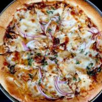 Bbq Chicken Pizza · Shredded grilled chicken, mozzarella cheese, red onions, cilantro and BBQ sauce.