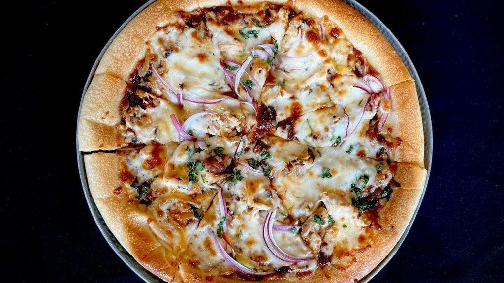 Bbq Chicken Pizza · Shredded grilled chicken, mozzarella cheese, red onions, cilantro and BBQ sauce.