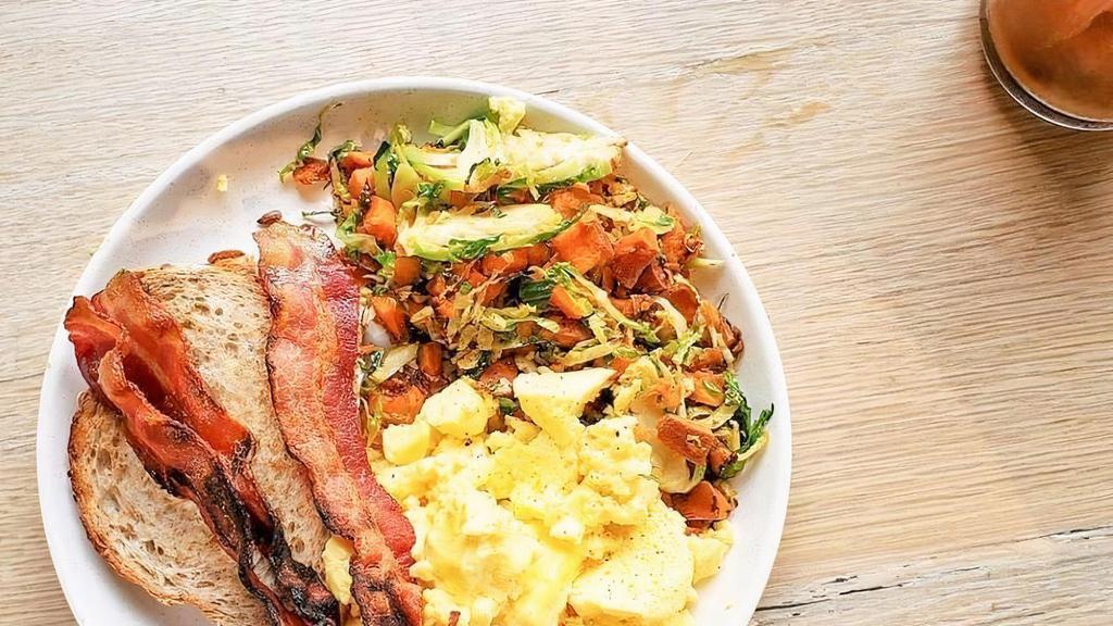 Brekkie Of Champions · scrambled eggs + bacon + sweet potato-brussel sprout hash + multigrain toast