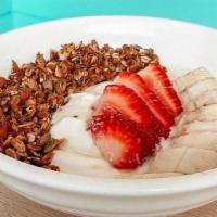 House-Made Granola Bowl · yogurt topped w/ in-season fruit + chia-sunflower seed granola + honey drizzle. Vegetarian.