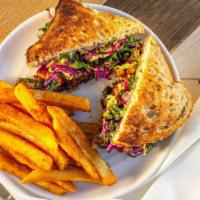 Hash Grilled Cheese · multigrain + white cheddar + roasted asparagus + sweet potatoes + brussel sprouts + onion + ...