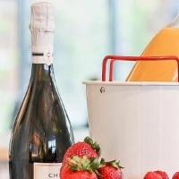 Mimosa Kit (Alcohol) · fresh orange juice + 750ml brut champagne, berries. Plastic cups included.
