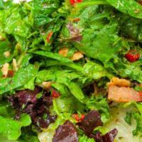 Fattoush · Vegan. Vegetarian. Mixed greens, tomatoes, cucumbers, parsley, pimentos, and zaatar pita chi...