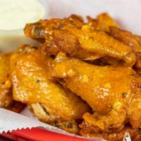 Wings (18 Pieces) · Includes one side dip of blue cheese or ranch and celery sticks.