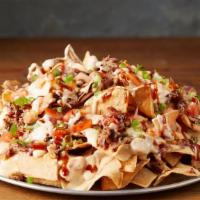 Bbq Nachos · BBQ Nachos include freshly fried tortilla chips, your choice of meat, and our signature ques...